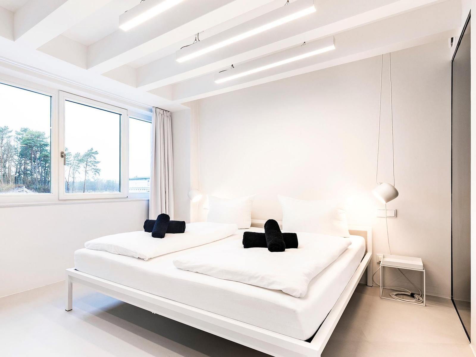 Schlafzimmer 1: Doppelbett (180x200), TV, Badezimmer 1 - en suite