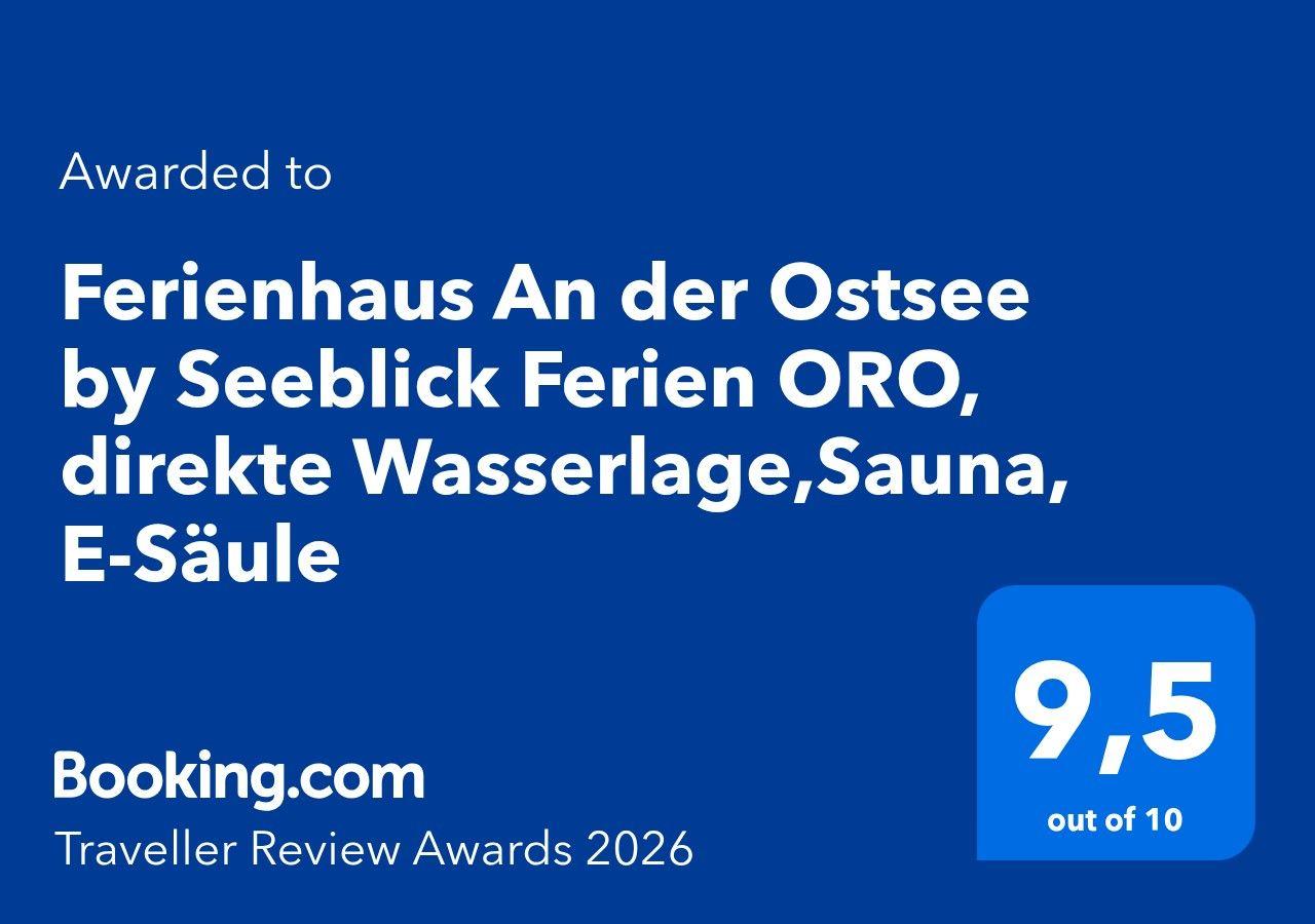 Ferienhaus an der Ostsee mit direkter Wasserlage, Sauna und E-Säule. Bewertung 9,5 von 10.