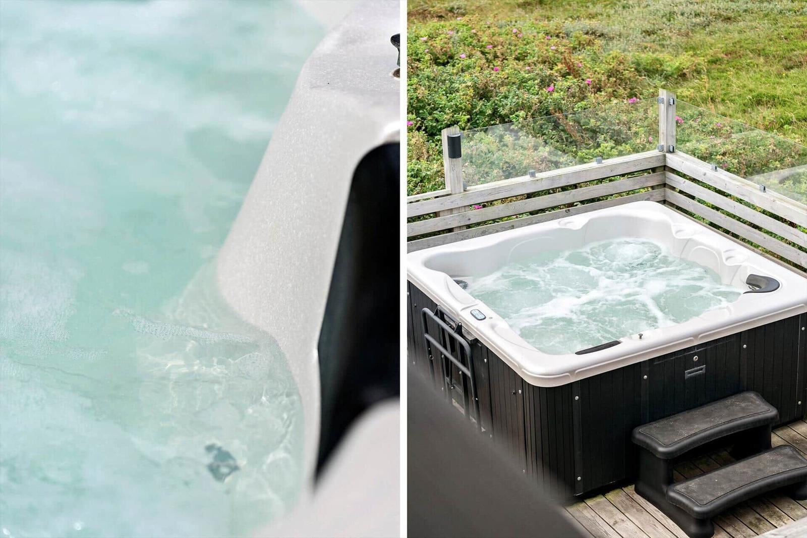 Whirlpool mit Blick auf grüne Wiese und Blumen