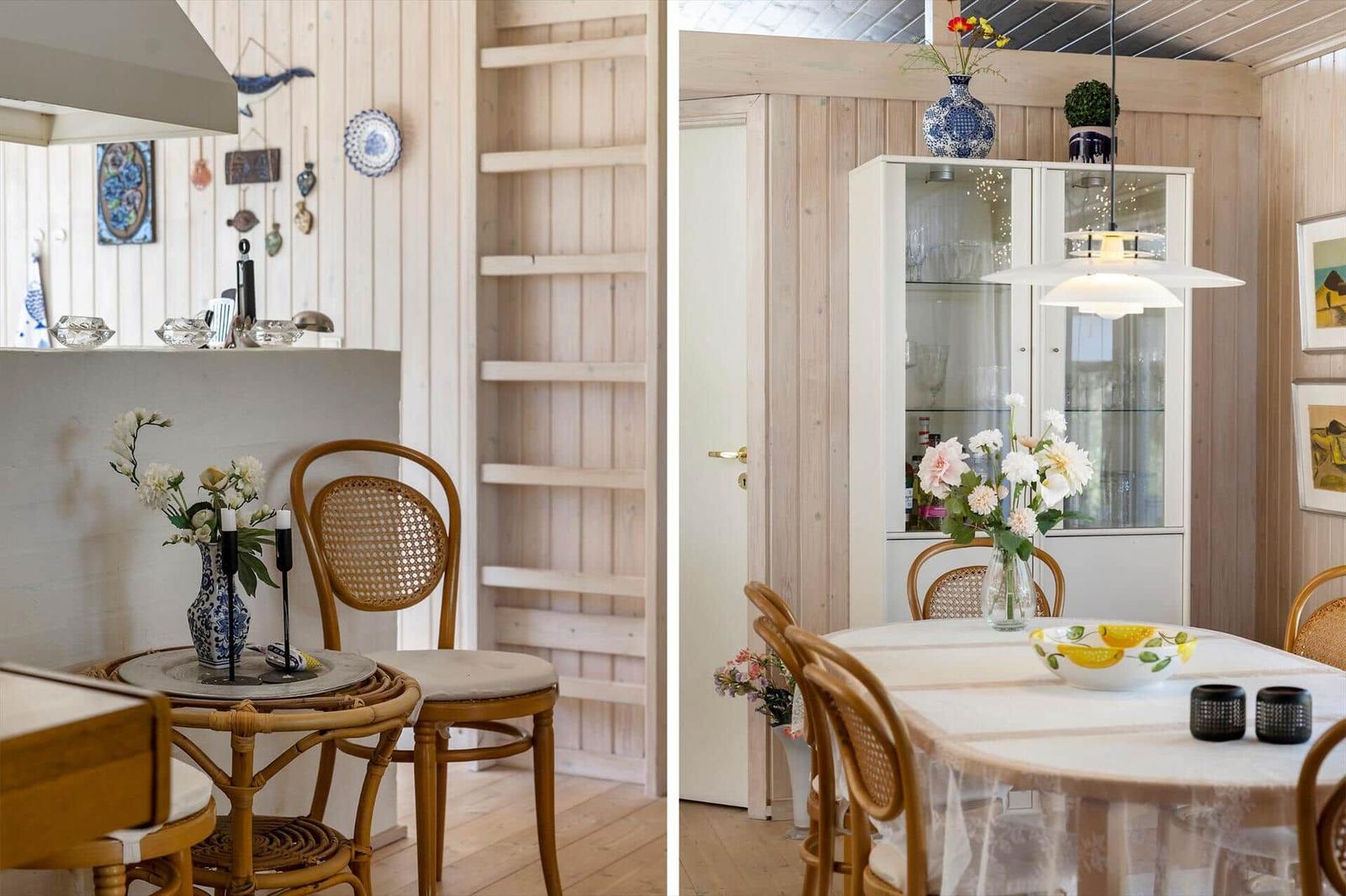 Küche und Esszimmer mit Holzwänden, Esstisch, Stühlen und Dekoration.