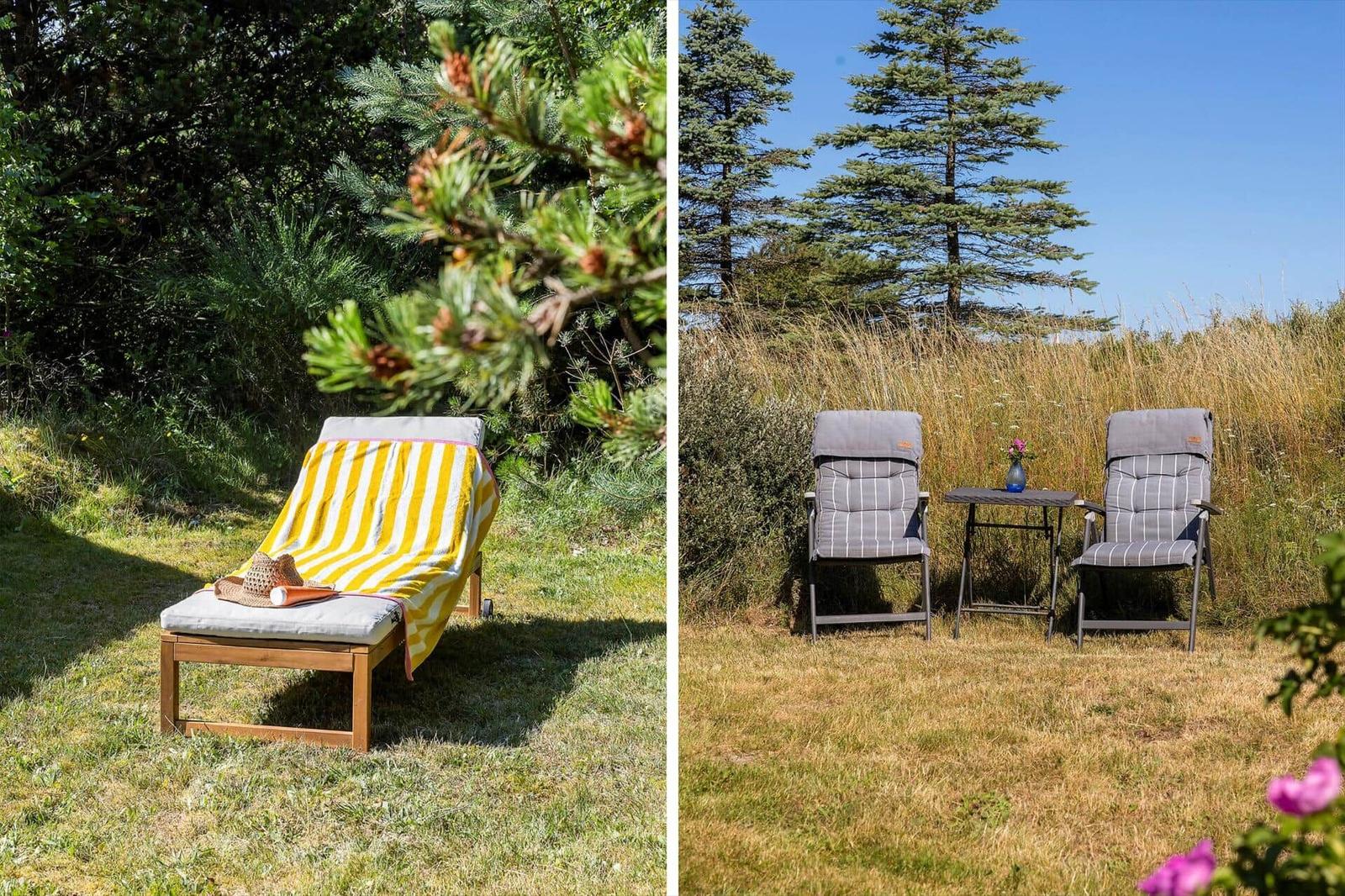 Außenbereich mit Liegestuhl und Sonnenschirm. Zwei Stühle mit Tisch im Gras.
