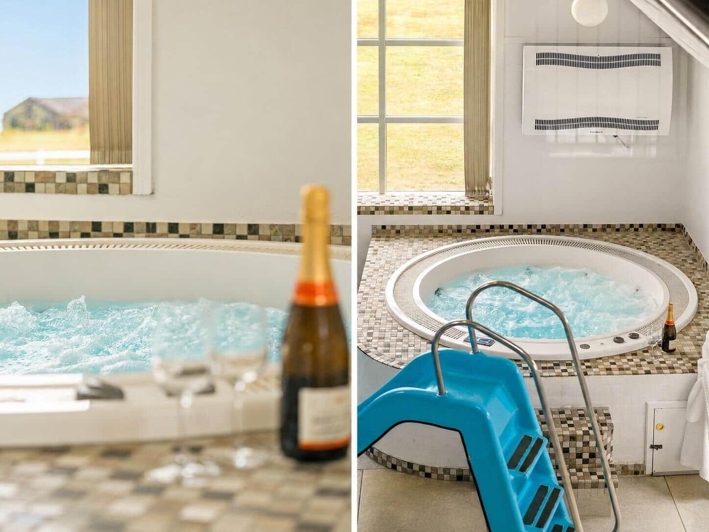 Whirlpool mit Sitzstufen und Flasche Champagner. Blick auf grünes Feld.