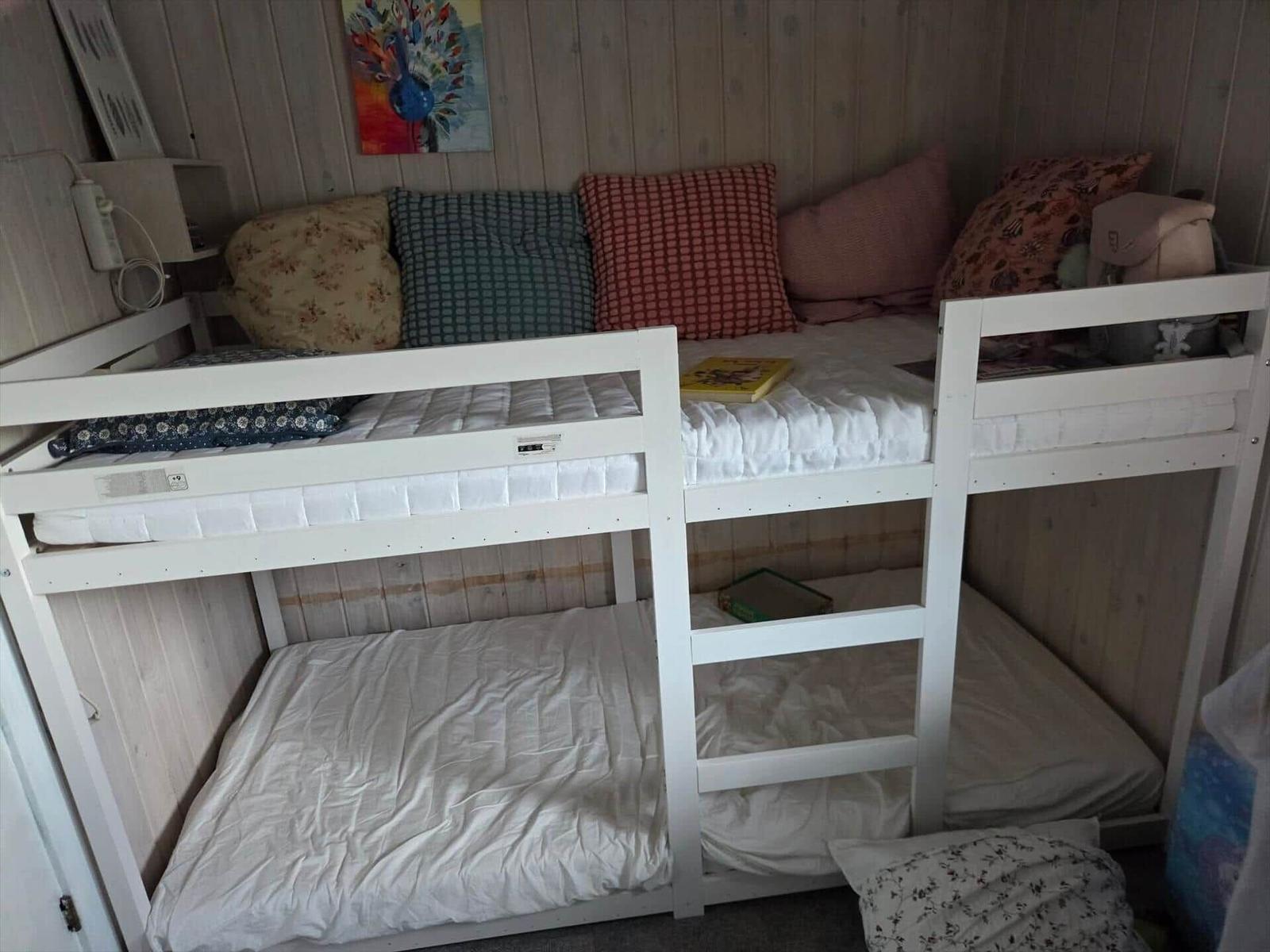 Symbolerklärung für Ferienhausgrundriss mit Möbel- und Raumbezeichnungen.