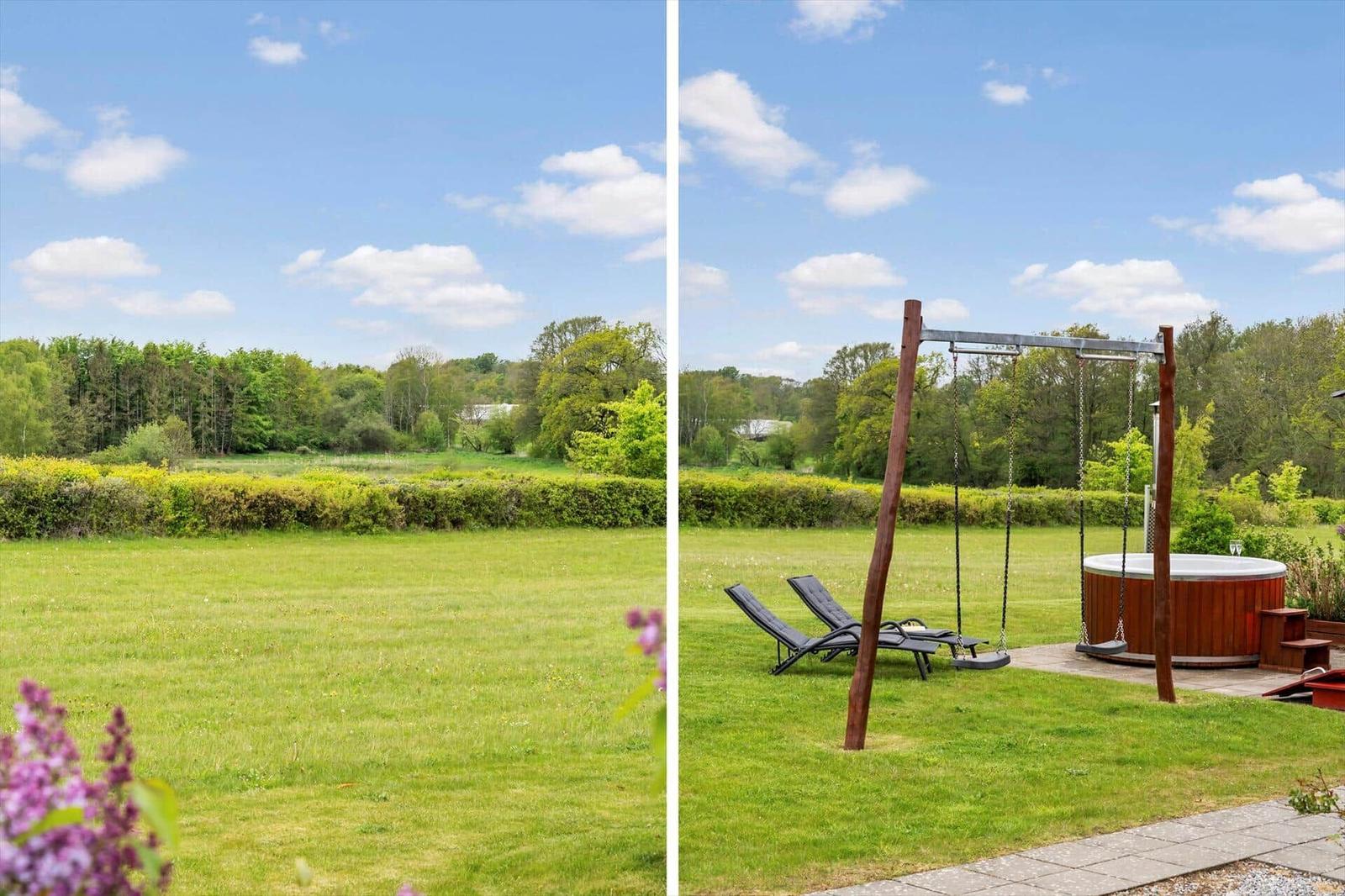 Green garden with hot tub and loungers under blue sky.