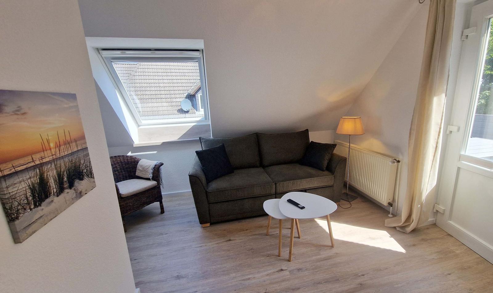 Wohnzimmer mit Blick zur Dachterrasse...