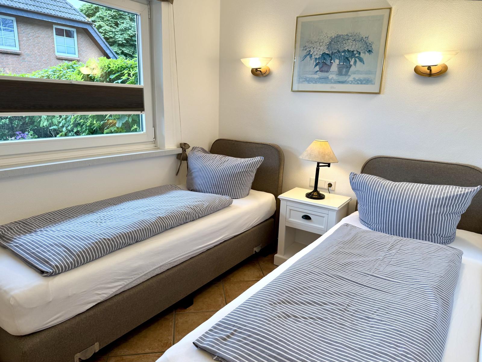 Schlafzimmer mit zwei Einzelzimmer (können bei Bedarf zusammengeschoben werden)