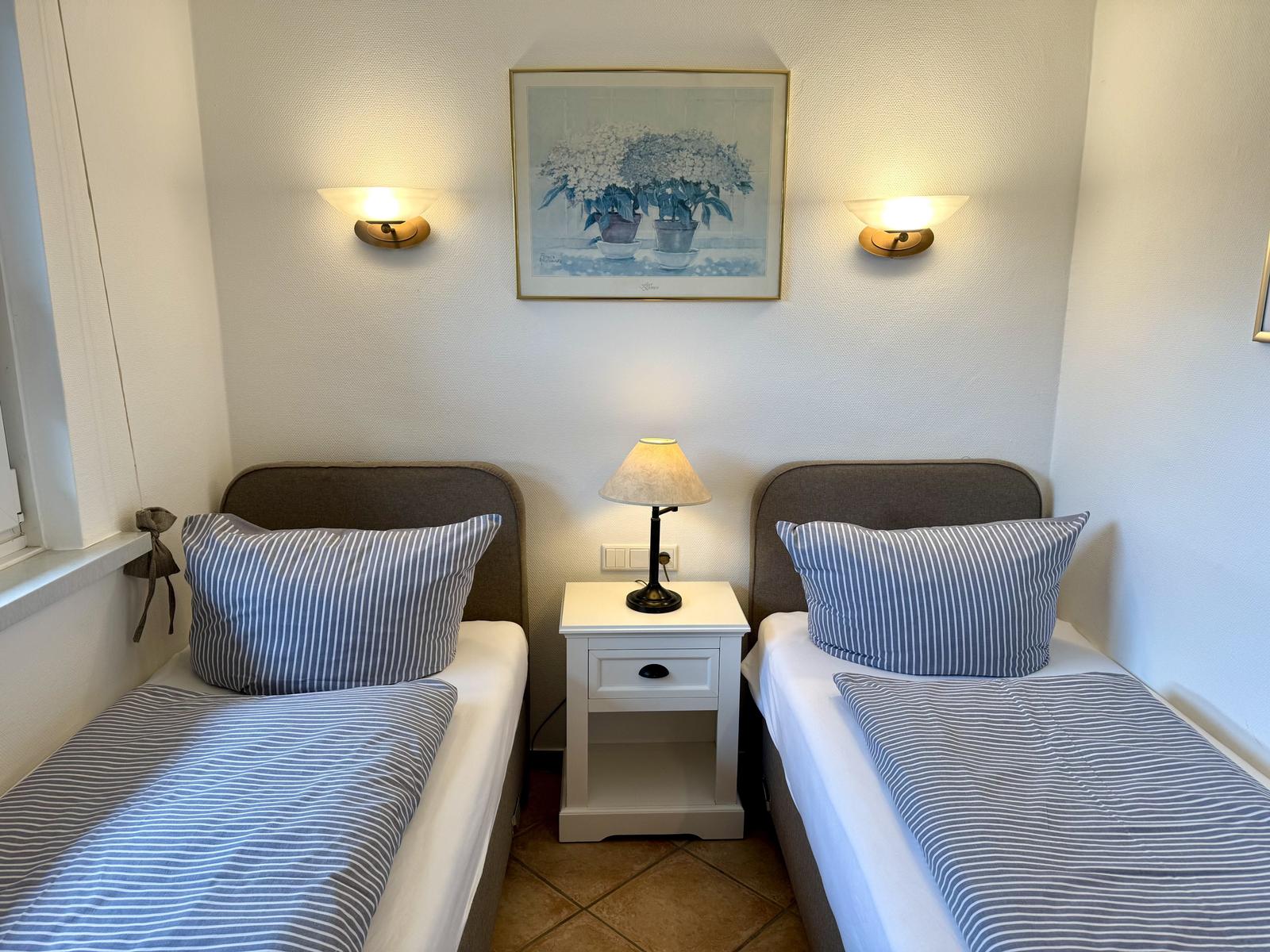 Schlafzimmer mit zwei Einzelzimmer (können bei Bedarf zusammengeschoben werden)