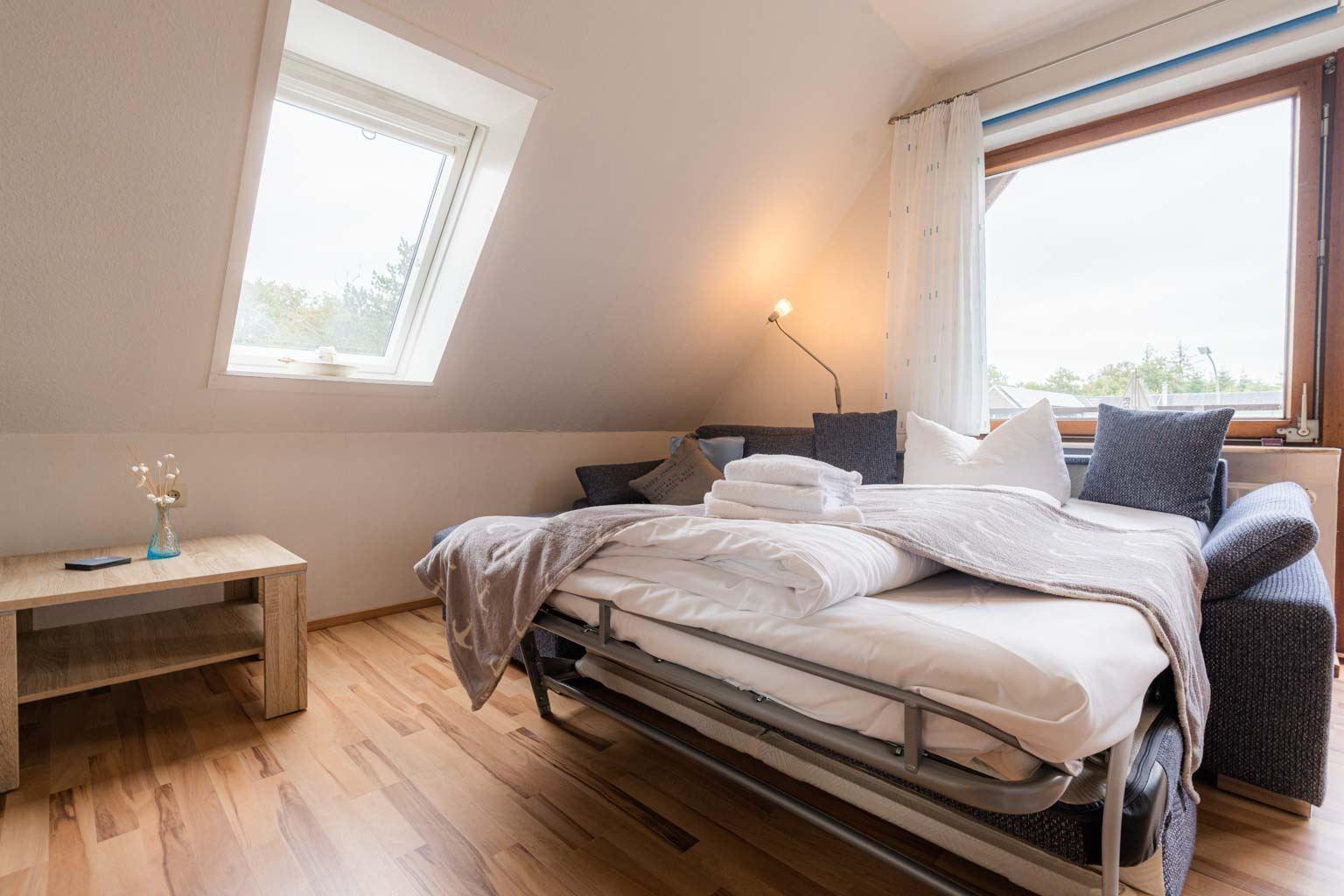 Wohnzimmer mit Schlafsofa...