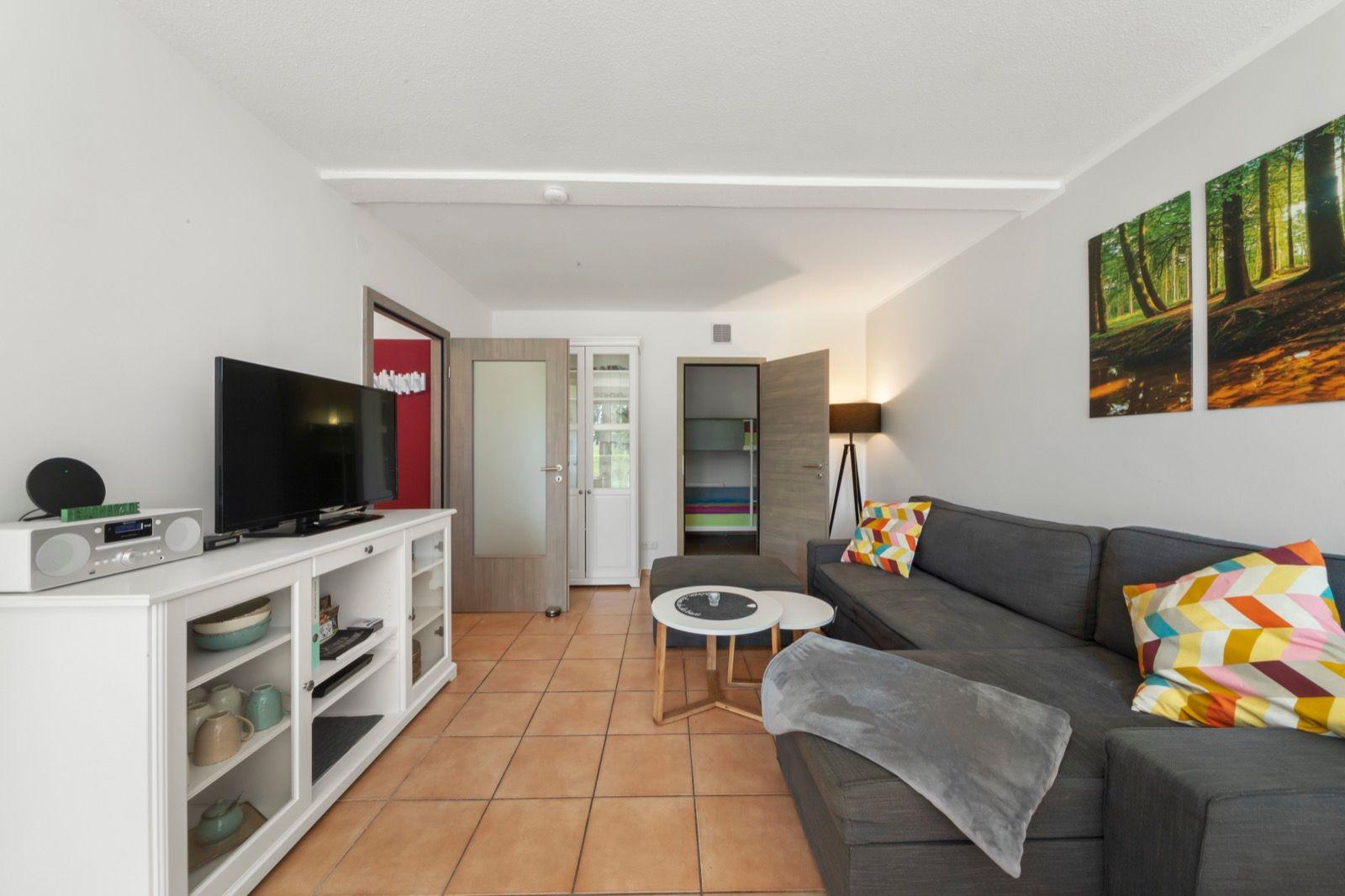 Wohnzimmer mit Schlafsofa