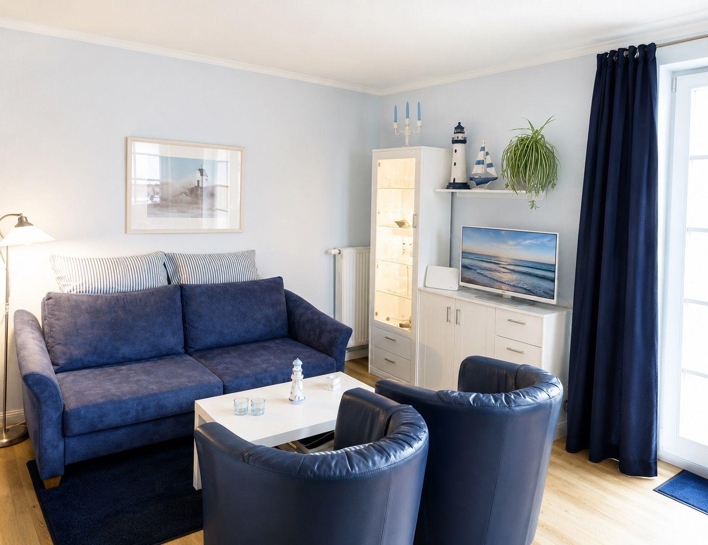 Sitzecke mit Doppelbettsofa und WLAN