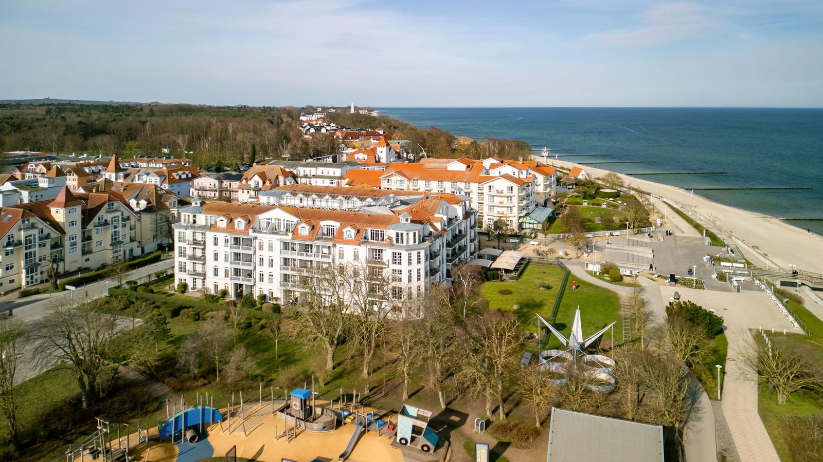 Holiday complex near beach with playground and green areas