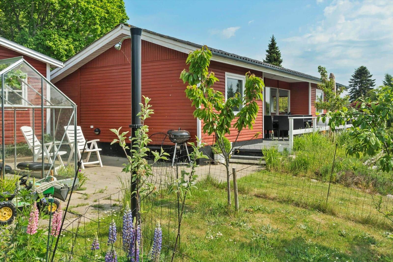 Two bedrooms, kitchen, bathroom, and living area with compass