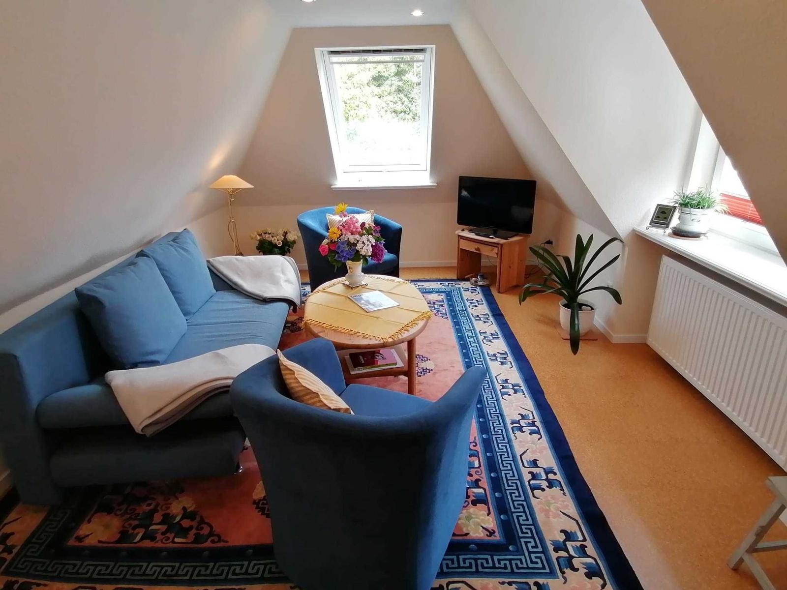 Wohnzimmer mit Sitzecke