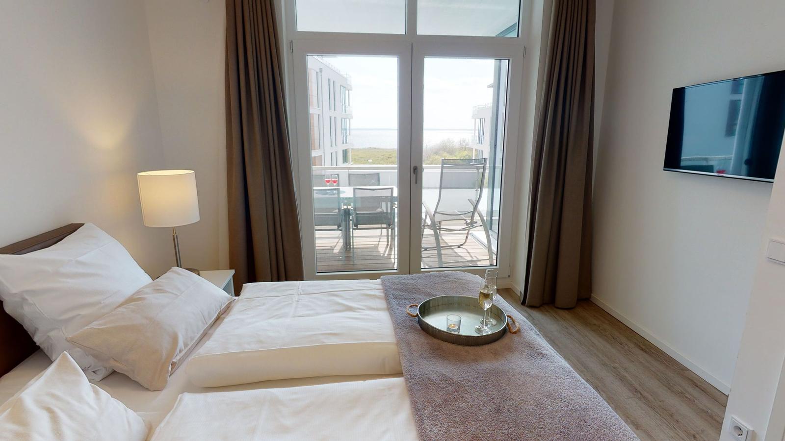 Wohnung mit Schlafzimmer, Bad, Küche und Balkon. Flur und Abstellraum vorhanden.