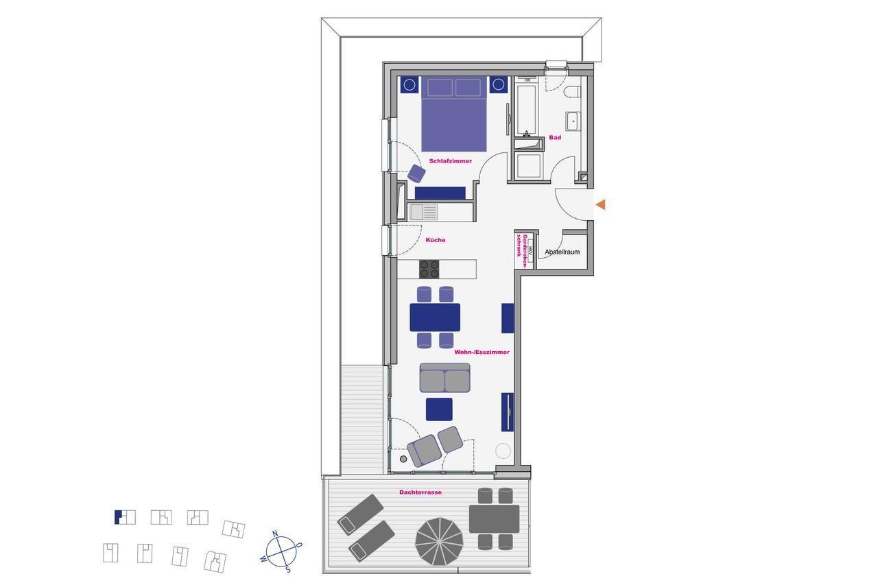 Ferienapartment in moderner Wohnanlage mit Blick auf Küstenlandschaft und Wiese.