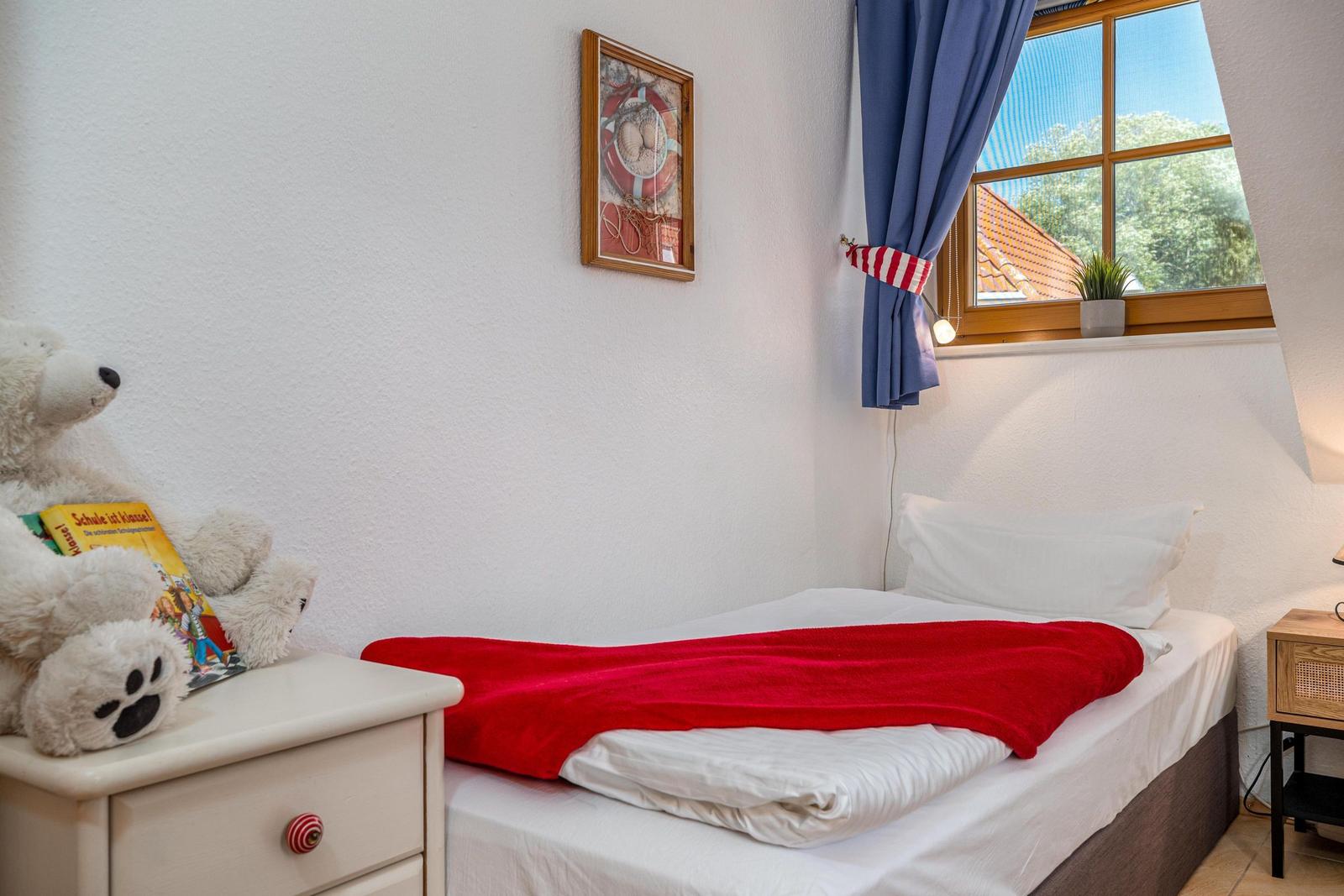 Schlafzimmer mit zwei Einzelbetten