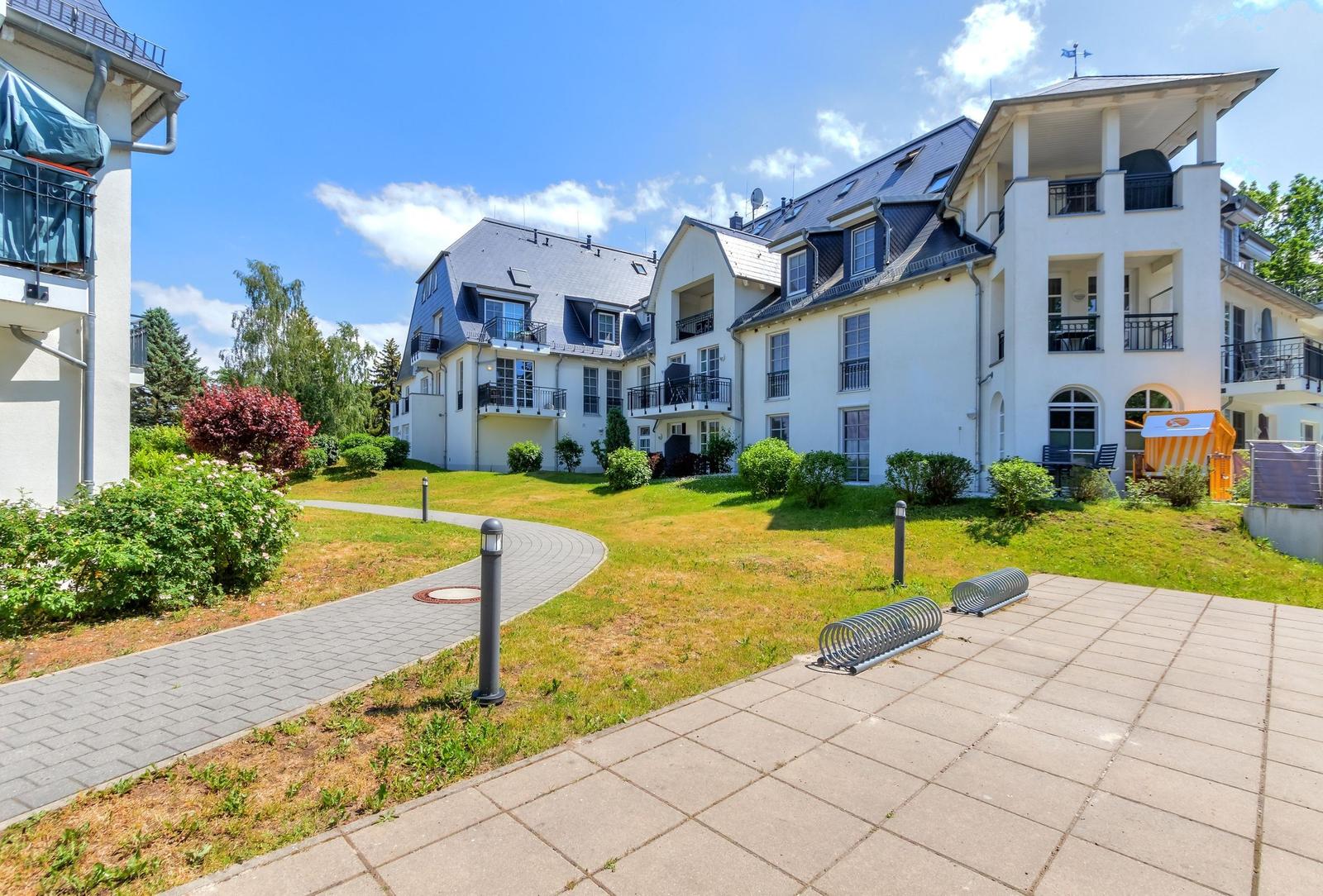 House with balconies and garden view of lake