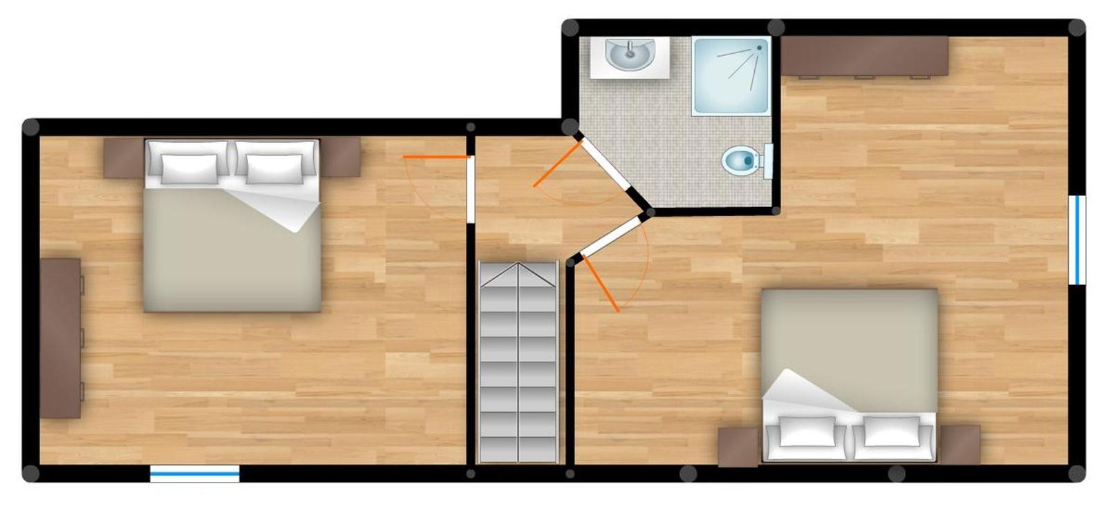 Large shower with bench and sinks. Large windows with view of green area.