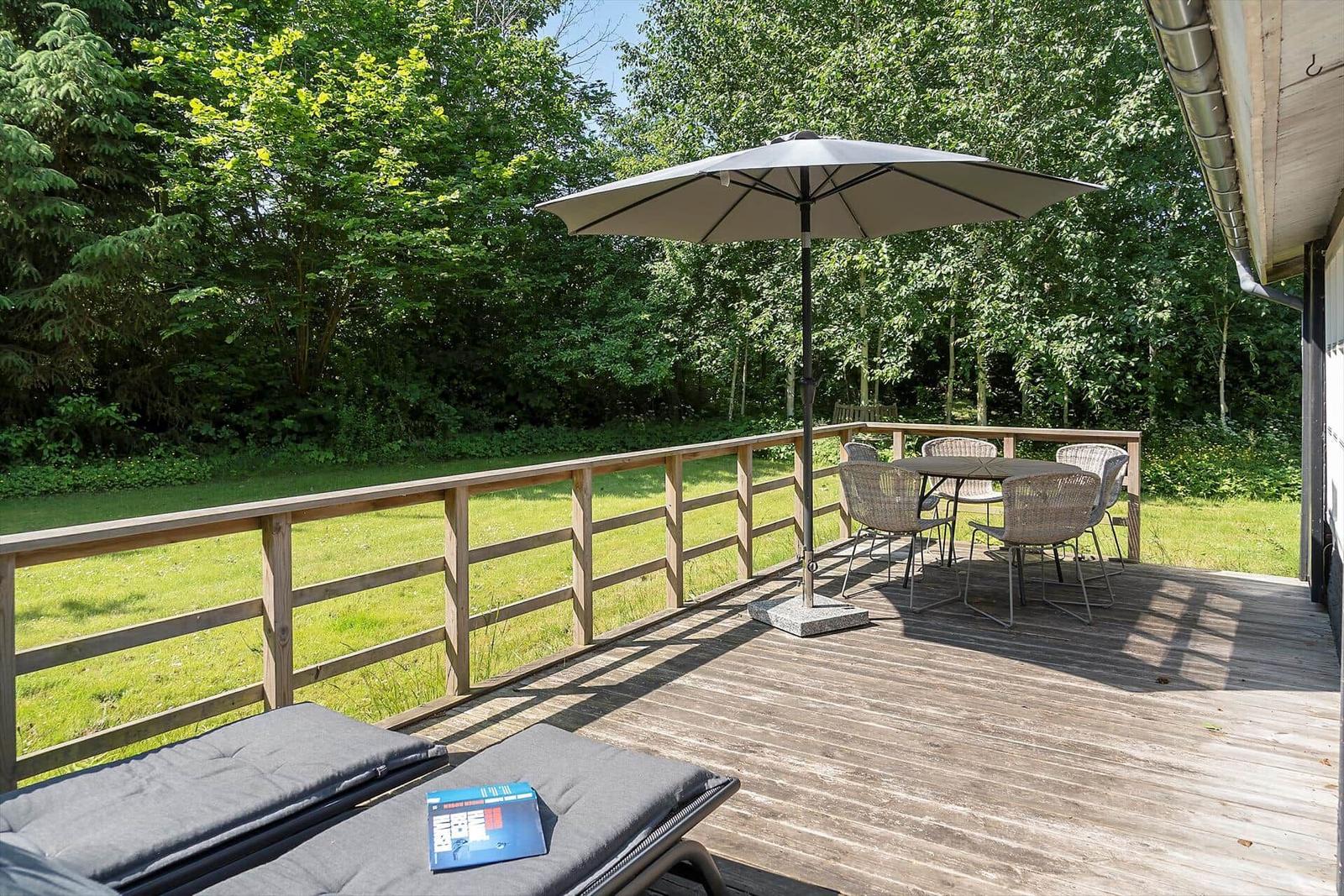 House with terrace, garden, and barbecue area in the woods