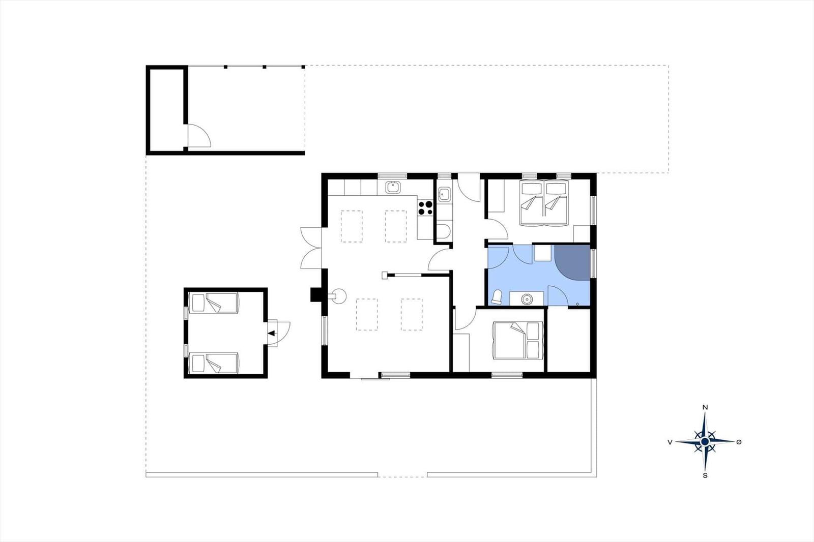 This floor plan shows an apartment with a kitchen, two bedrooms, and a bathroom.