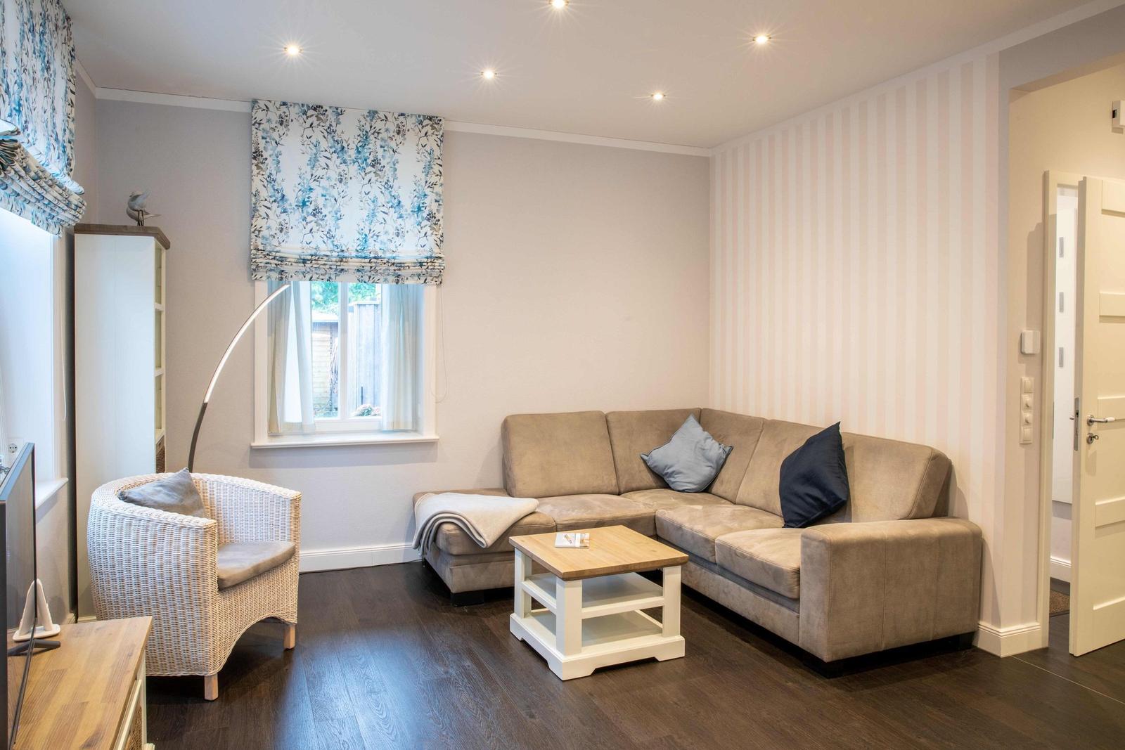 Apartment with two bedrooms, kitchen, living area, and shower bathroom.