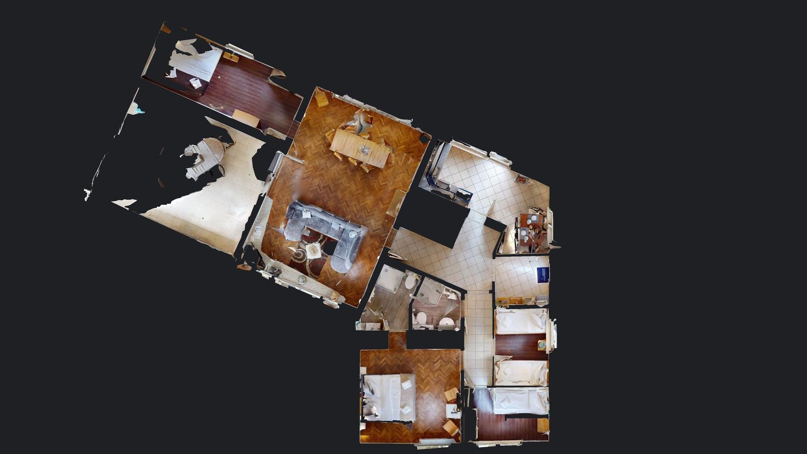 Übersicht über die Wohnung mit mehreren Räumen und Schlafbereichen.