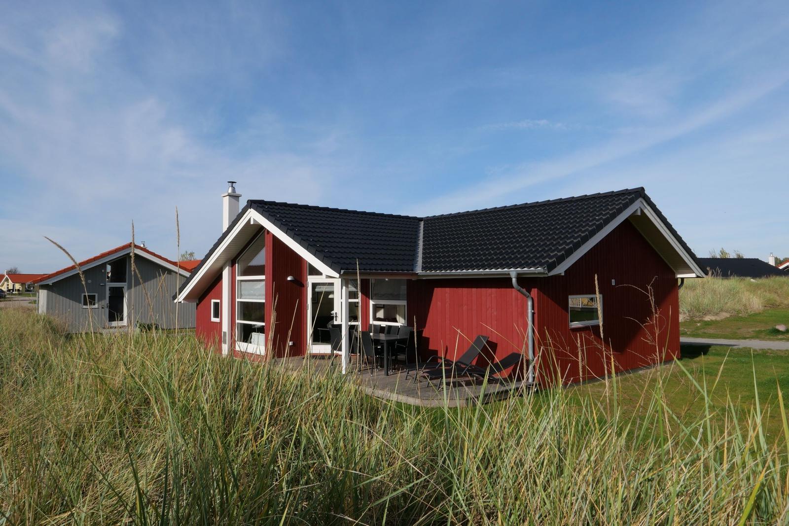 Grundriss von Haus C mit drei Schlafzimmern, Küche, Bad und Sauna.