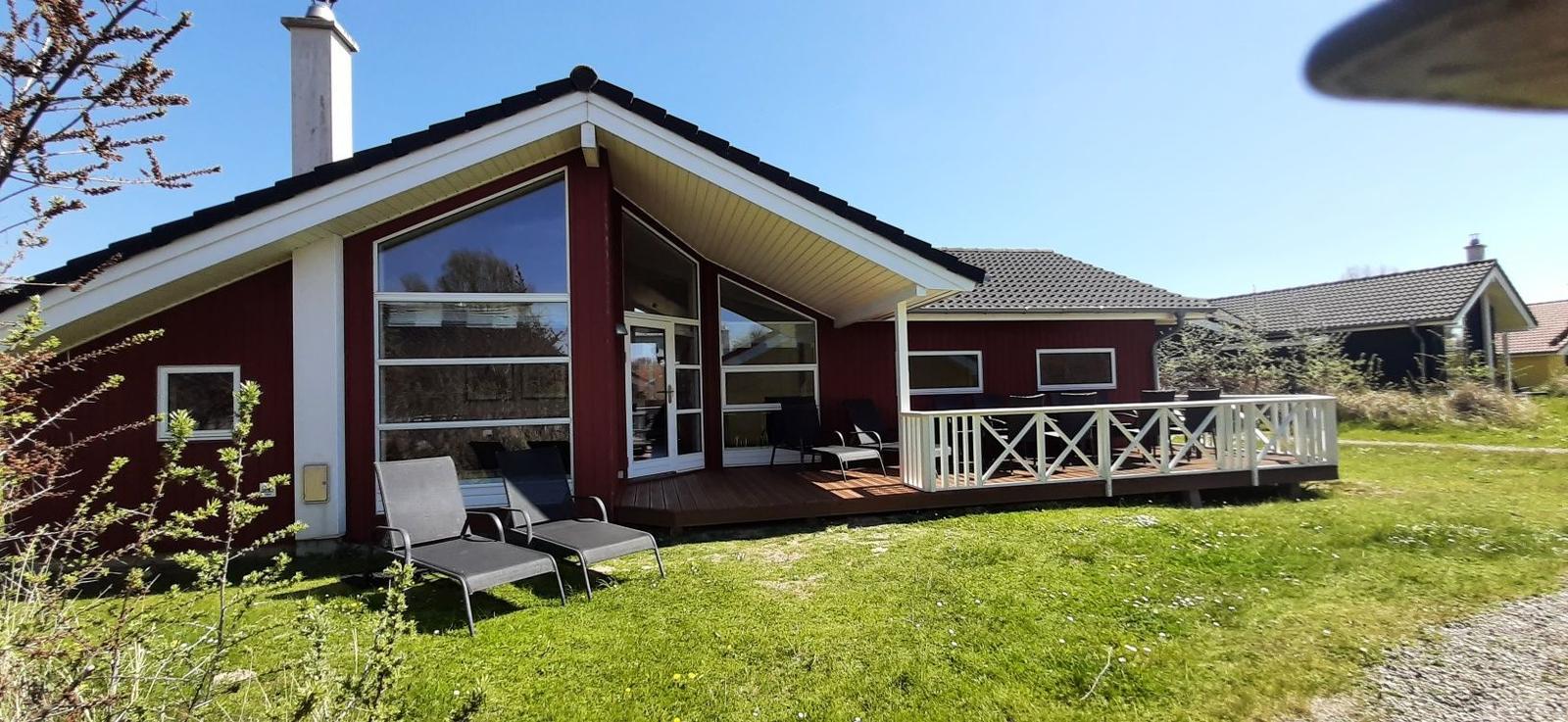 Grundriss von Haus D mit vier Schlafzimmern, Küche, Bad und Sauna.