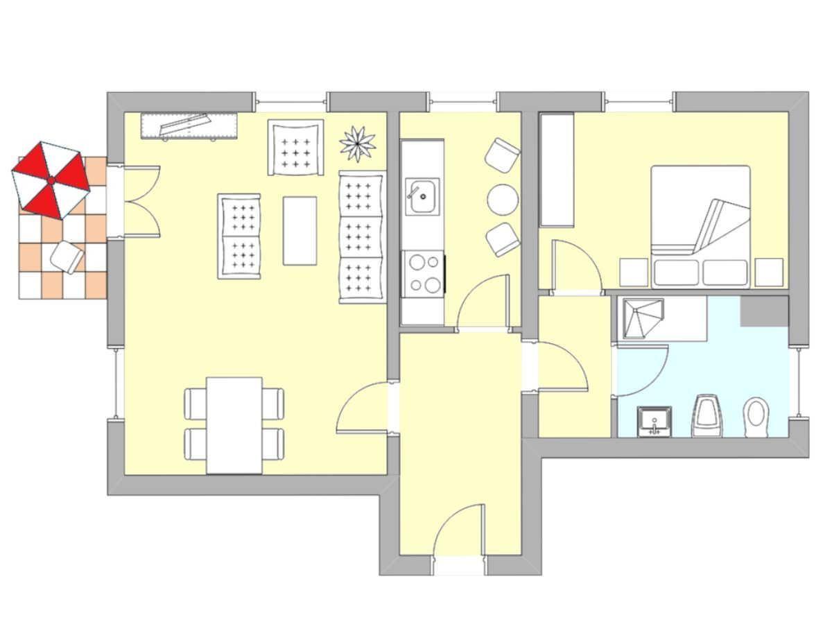 Wohnung mit Küche, Schlafzimmer, Bad und Terrasse mit Sonnenschirm.