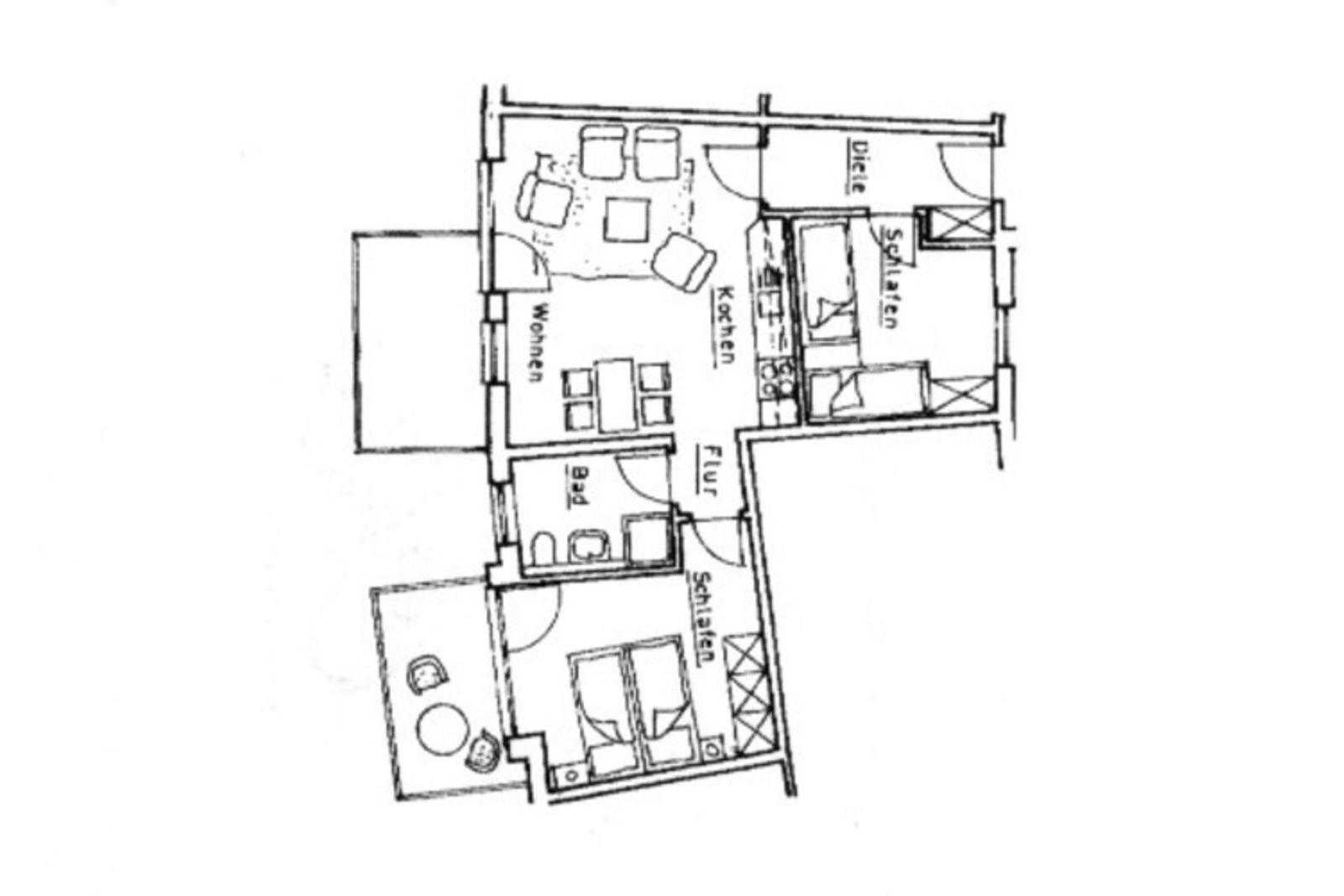 Wohnung mit Küche, Schlafzimmer, Bad und Wohnbereich. Flur und Dielen sind eingezeichnet.