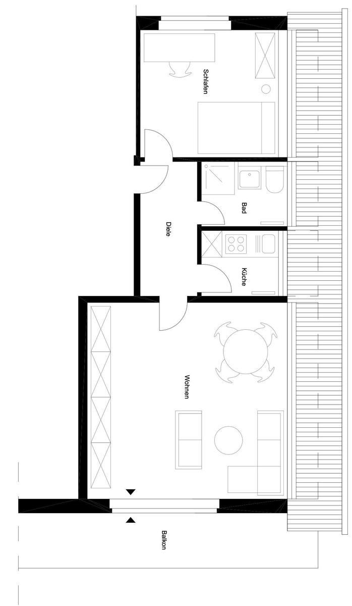 Wohnung mit Küche, Bad, Schlafzimmer und Wohnbereich mit Balkon.