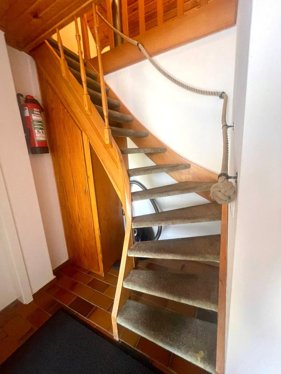 Staircase leading to the apartment.