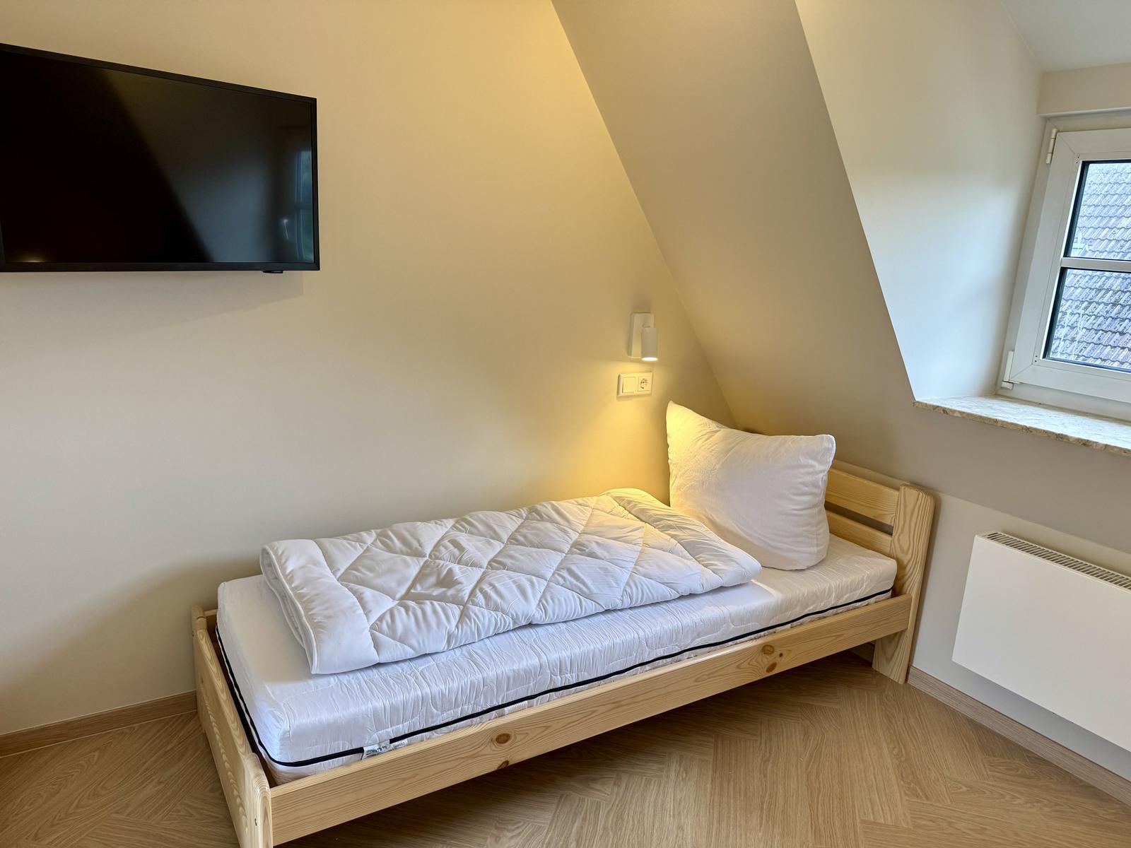 Schlafzimmer mit zwei Einzelbetten (je 80 x 200 cm)