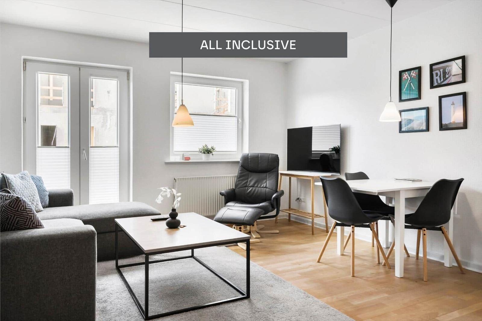 Two bedrooms, kitchen, bathroom, and stairs with compass view.