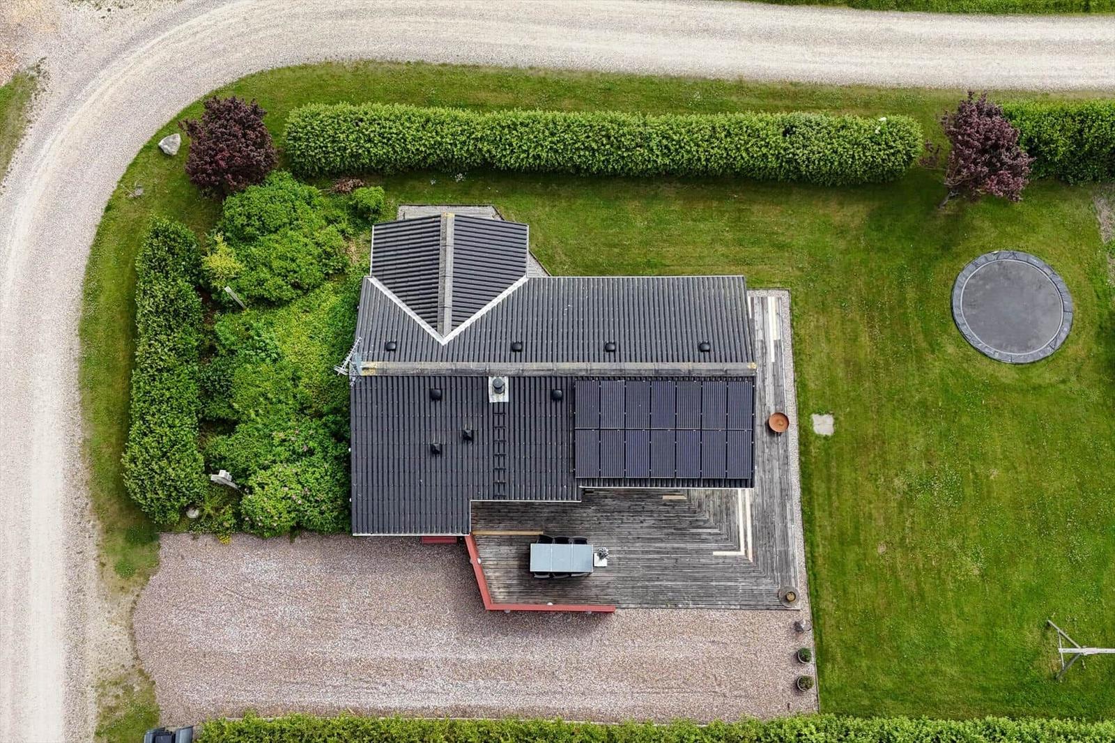Symbolerklärung für Ferienhausgrundriss mit Raumbezeichnungen und Möbeln.