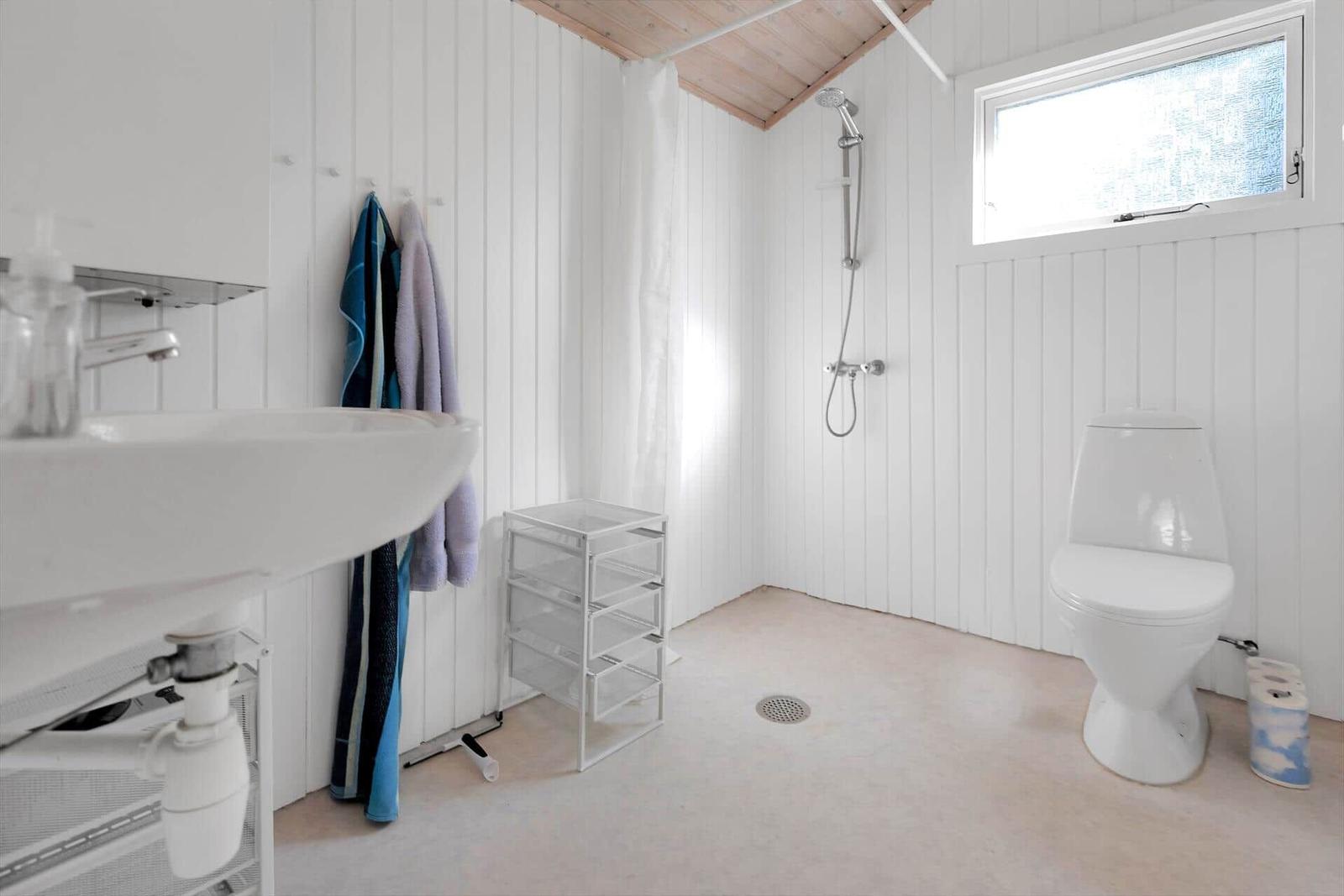 This apartment has a kitchen, a living room, two bedrooms, and a terrace.