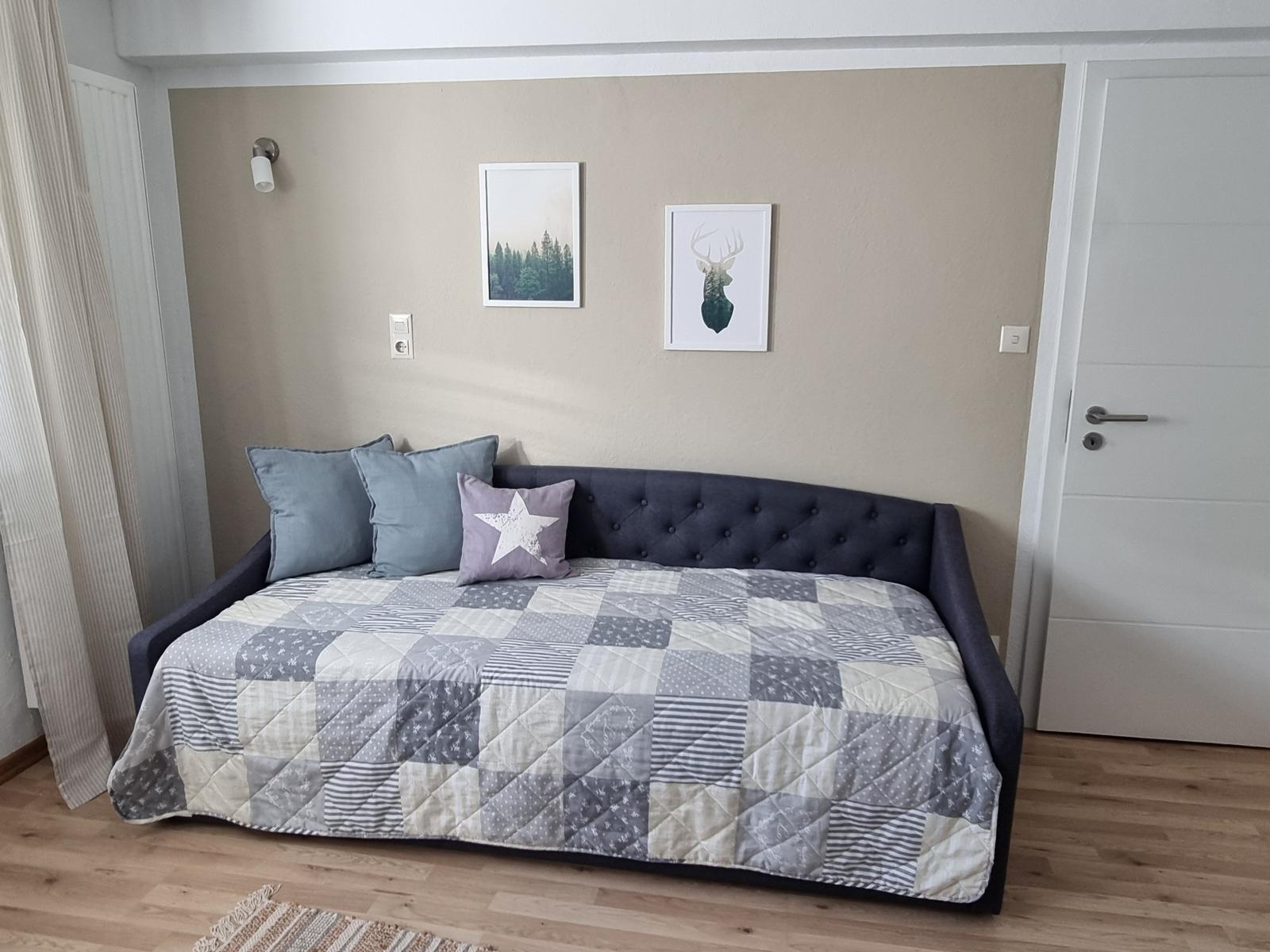 Zusätzliches Tandembett zum Ausziehen im Schlafzimmer