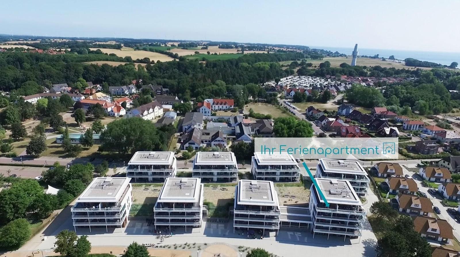 Wohnung mit Schlafzimmer, Bad, Küche und Wohnbereich mit Dachterrasse.