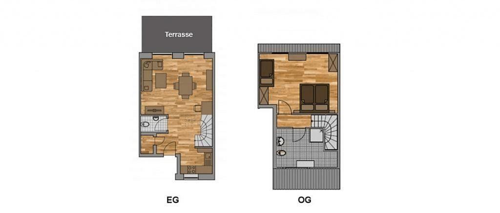 Haus mit Arkadenhof und rotem Dach, umgeben von Grünfläche und Bäumen.