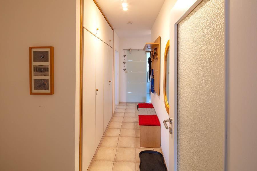 Hallway with coat rack and benches
