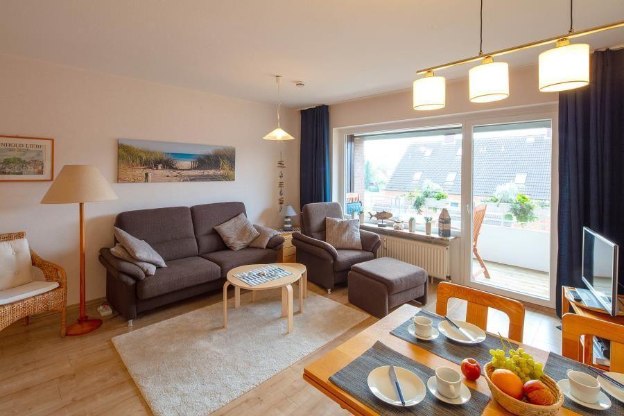 Cozy Living Room with Sofa and Dining Table