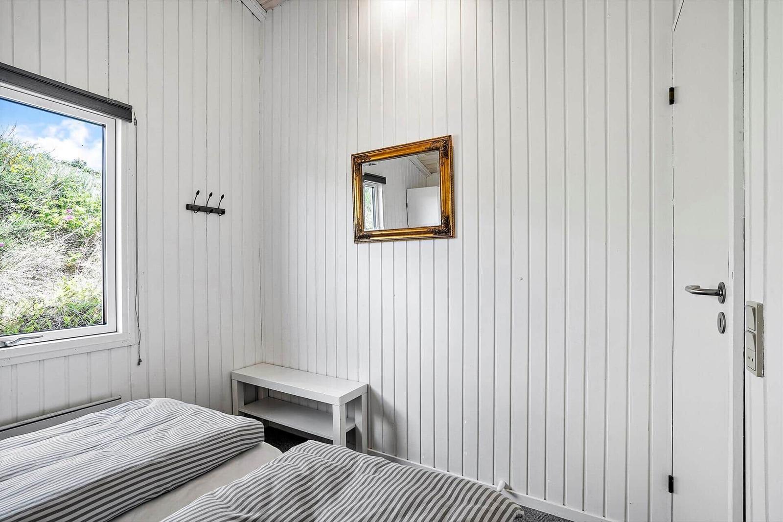 Funktionaler Grundriss mit Schlafzimmer, Küche und Bad.