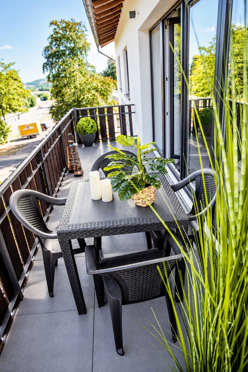 Apartment with bedroom, kitchen, bathroom, and terrace. Modernly furnished.