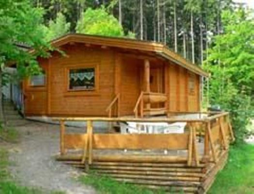 HarzCamp Bremer Teich Rustikaler Bungalow Ferienhaus in Gernrode