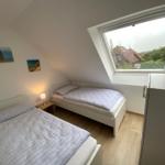 Schlafzimmer mit zwei Einzelbetten