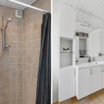 Bad mit Dusche und Waschbeckenbereich mit Schränken und Spiegel