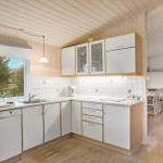 Kitchen with window, sink, dishwasher, and worktop