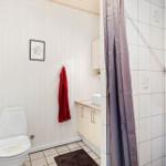 Bathroom with shower, toilet, and sink
