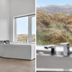 Bad mit Badewanne und Aussicht auf Graslandschaft