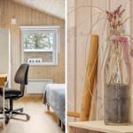 Schlafzimmer mit Schreibtisch, Bett und Fenster. Dekorative Glasvase mit Sand und getrockneten Pflanzen.